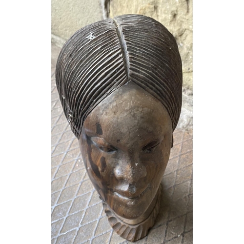 57 - Carved wooden head bust of an African lady