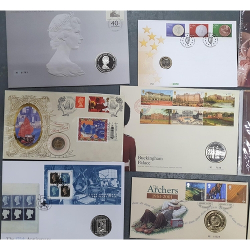 165 - 11 QEII stamp & coin sets including many limited edition examples (11)