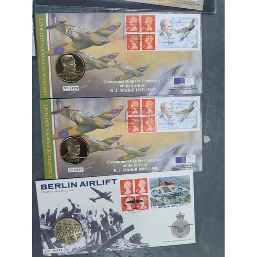 167 - 7 WW2 related QEII stamp & coin sets together with a Berlin airlift and a WW! related example with a... 