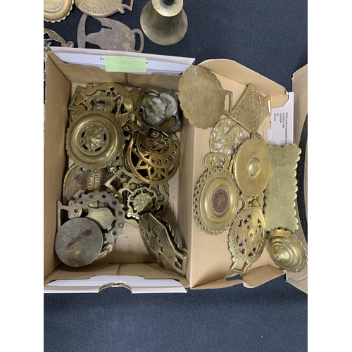 107 - Box of horse brasses and a small hand-bell (Qty)