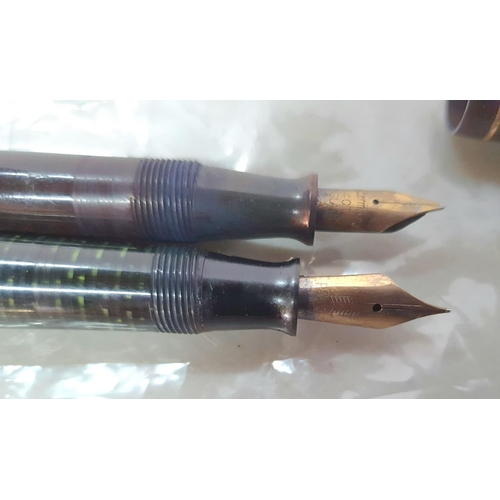 137 - Two 14ct gold nibbed fountain pens, a Parker Vacumatic & a Waterman's fountain pen (2)