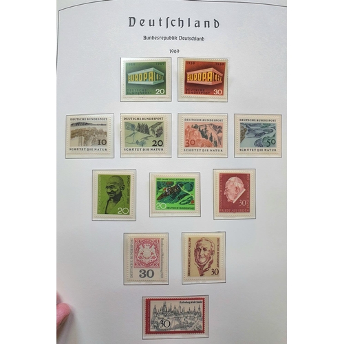 190 - Blue album containing Germany 1968 & 1969 complete sets & mini-sheets, both mint unmounted and used ... 