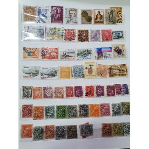 192 - Three stamp albums containing a large quantity of world stamps including a large quantity of mint un... 