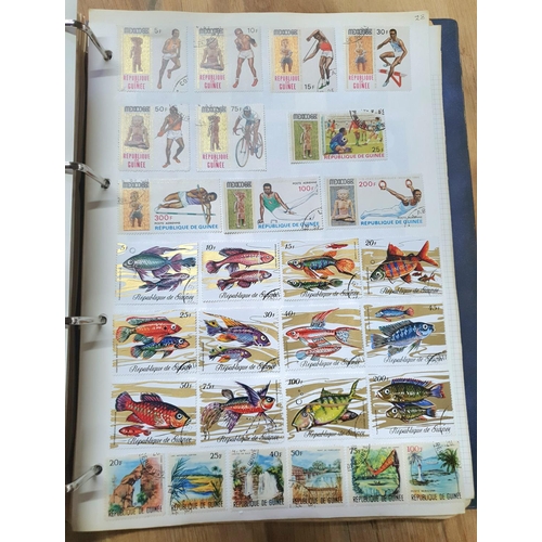 202 - Two world albums including thousands of world stamps, many Denmark, Finland, Greece, United Nations,... 