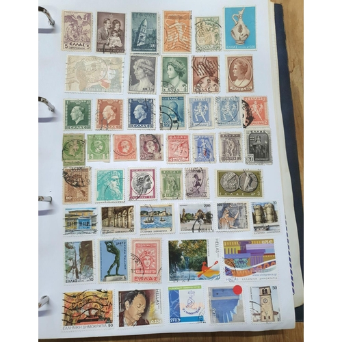 202 - Two world albums including thousands of world stamps, many Denmark, Finland, Greece, United Nations,... 