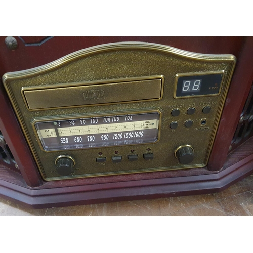 249 - Record player in the form of an old home radio