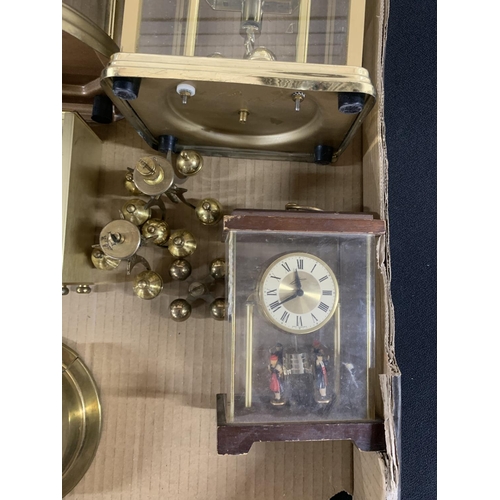 300 - Box of mantle clocks and a wall clock