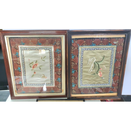 265 - Two framed silk pictures of flowers and butterflies in a decorated border together with an antique e... 