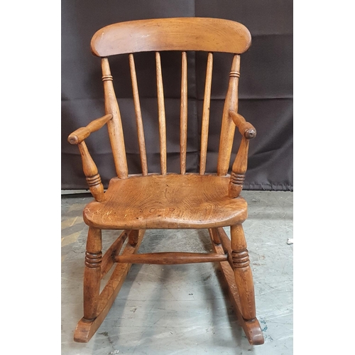 372 - Small antique Oak rocking chair