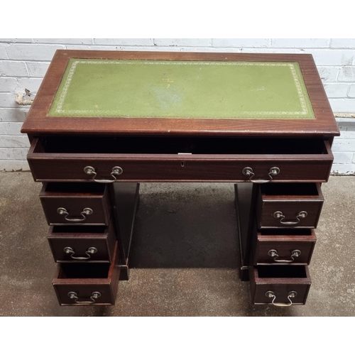 402 - Small pedestal desk with inlaid green leather top