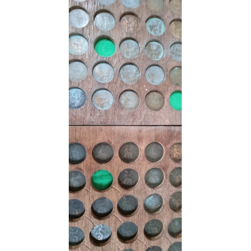 87 - Coin set in wooden holders including Victorian bun head pennies and 20thC British (Qty)