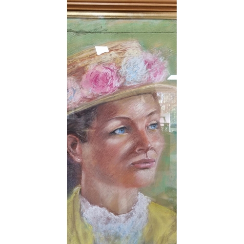 184 - J C Whitaker 2000 pastel portrait of a young lady in a straw boater,

The portrait measures 60 x 47c... 