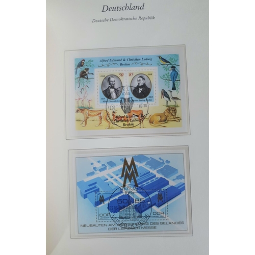 210 - Blue album of used sets and mini-sheets, DDR 1983-1990 (Qty)