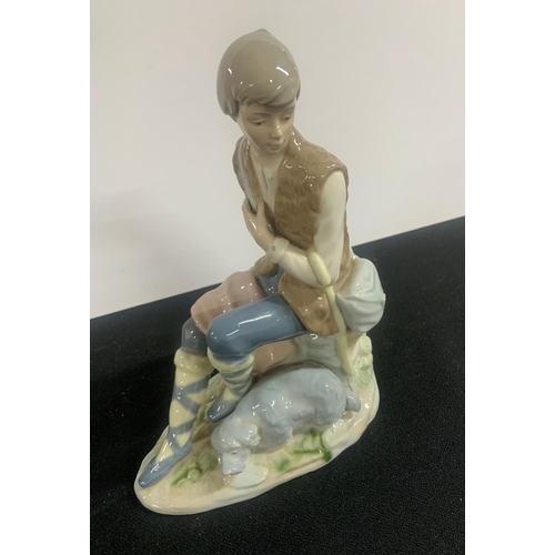 285 - Large Spanish porcelain seated boy