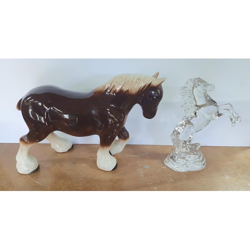 309 - Cut-glass model of oa rearing horse together with an unmarked oversized porcelain Shire horse (2)