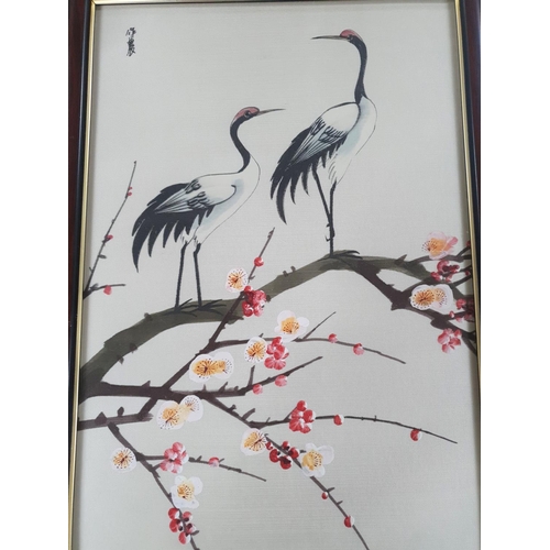 320 - Pair of Hong Kong watercolour on silk pictures depicting birds on a branch, both in matching frames ... 