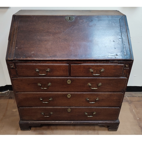 537 - Early Georgian Oak country writing bureau chest with drop-front revealing inner compartments above f... 