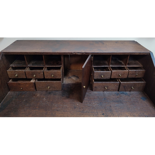 537 - Early Georgian Oak country writing bureau chest with drop-front revealing inner compartments above f... 