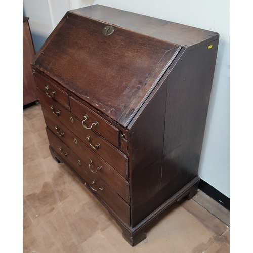 537 - Early Georgian Oak country writing bureau chest with drop-front revealing inner compartments above f... 