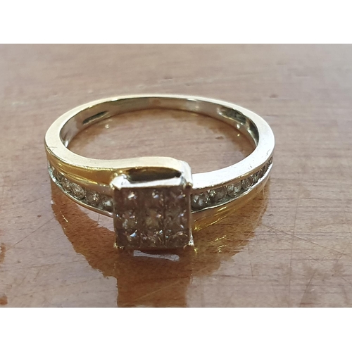 42 - 18K gold ring with central area of diamonds set in a square formation together with round cut diamon... 