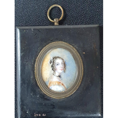 44 - Unsigned Georgian watercolour on plaster oval portrait of a young lady in an ebonised wood frame wit... 