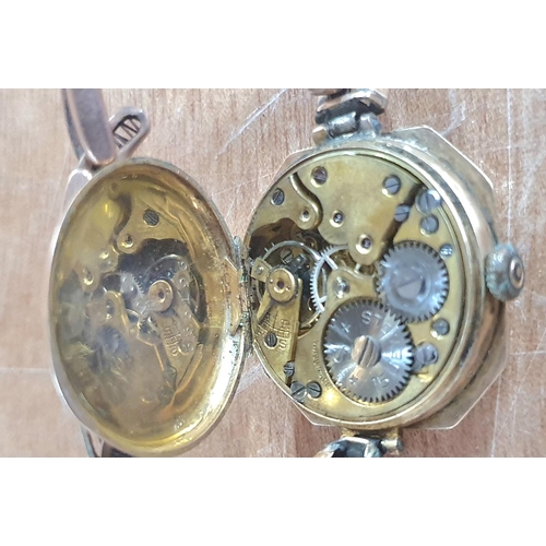 47 - Ladies antique 9ct gold cased wristwatch, circa 1900 with octagonal face and enamel dial with roman ... 