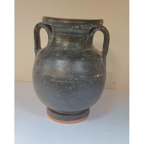 59 - A black glazed pottery Pelike vase, southern Italy, 4th or 5thC.

15cm tall

Provenance - Purchased ... 