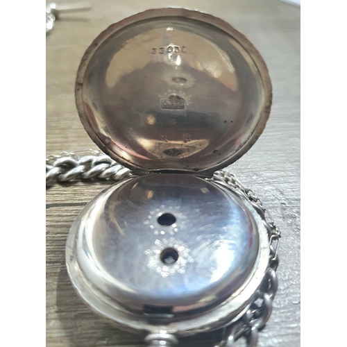 49 - Antique silver pocket watch with silver albert chain and key on a chain, the inside back of the watc... 