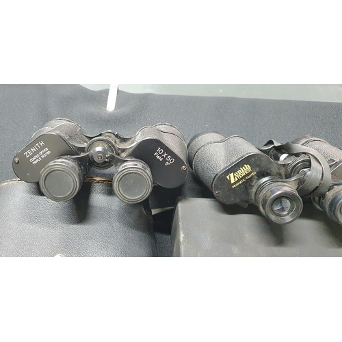 75 - Two cased sets of Zenith 10 x 50 Binoculars together with a cased set of Ajax binoculars (3)