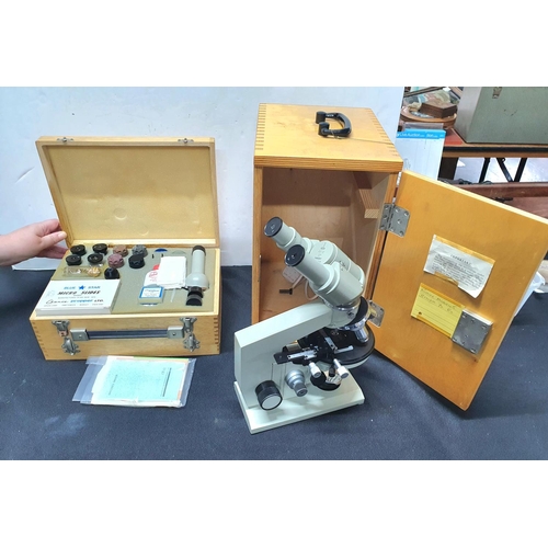 166 - Boxed Russian made LOMO BIOLAM MICROSCOPE together with a double ended case containing accessories.