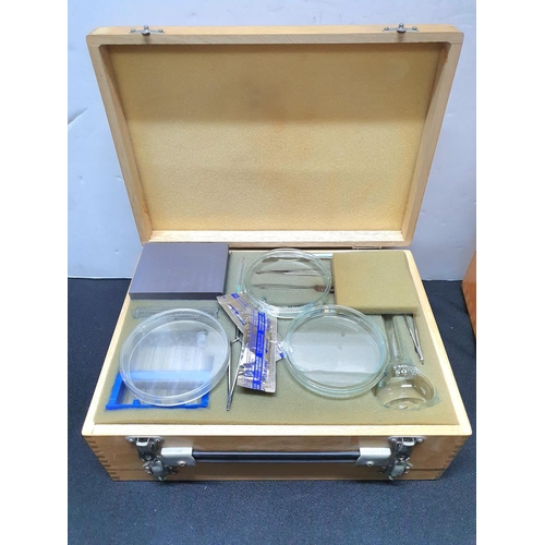 166 - Boxed Russian made LOMO BIOLAM MICROSCOPE together with a double ended case containing accessories.