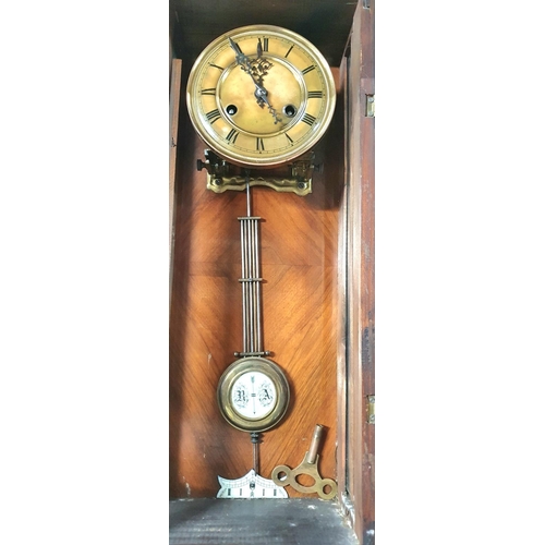 56 - Antique wooden wall clock with enamel dial and key