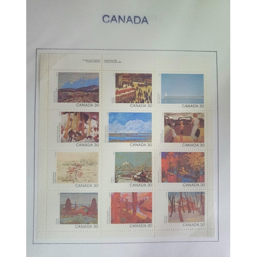 267 - Blue stock book Canada containing 1985 - 2015 Canada used and mint sets