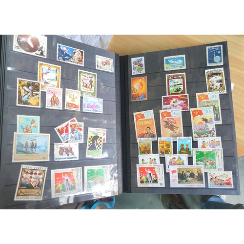 234 - 2 red albums of mixed world stamps including large collection of Korean m/m and m/u mini sheets etc