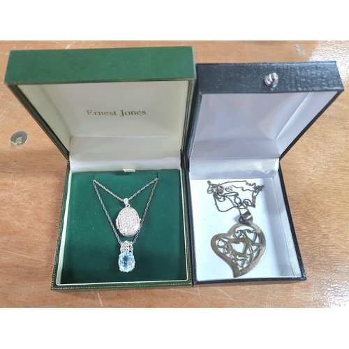 5 - Three silver necklaces, all  with different pendants housed in 2 presentation boxes (3)