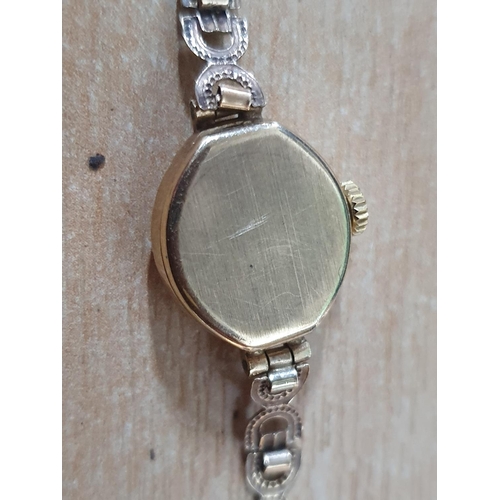 24 - Uno vintage ladies cocktail watch with 9ct yellow gold watch and strap,

9.5 grams gross