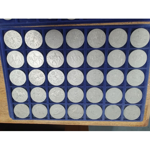 135 - Two trays of QEII commemorative coins and half crowns (70)