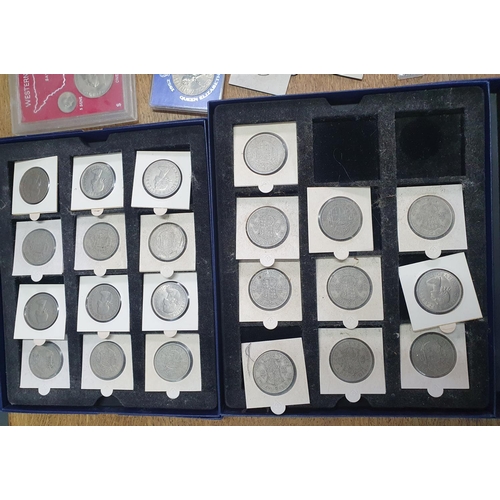 136 - Eclectic collection of coins to include 2 cased sets of QEII half coins, and many mixed UK and forei... 