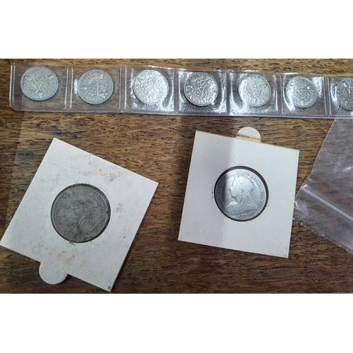 136 - Eclectic collection of coins to include 2 cased sets of QEII half coins, and many mixed UK and forei... 