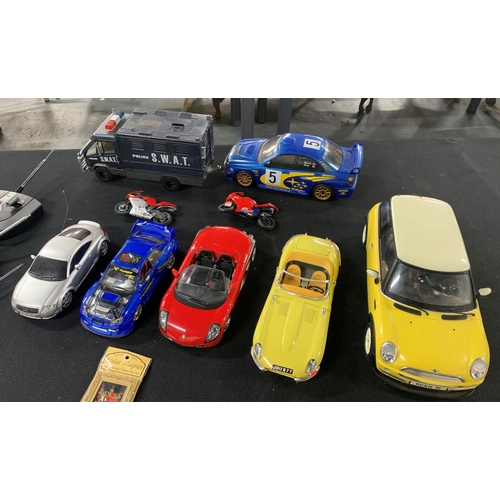 115 - Collection of radio controlled cars including Mini and Subaru (Qty)