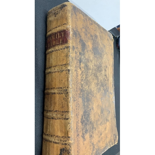 117 - Oversized 1788 Family Bible with tooled leather cover and numerous 18thC full sized religious prints