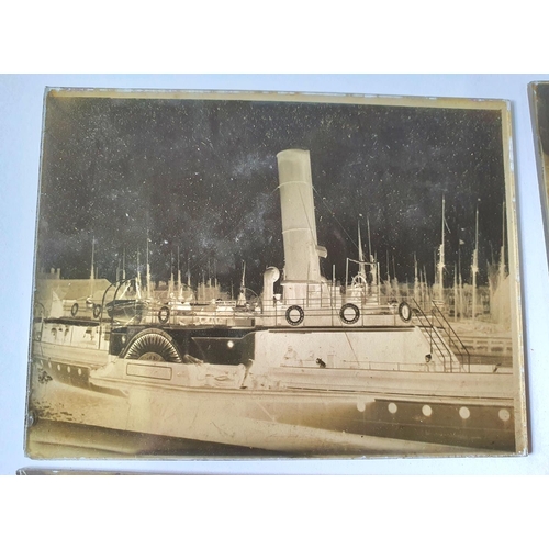 173 - Thirteen early 20thC glass photographic negatives depicting some continental town and harbour scenes... 