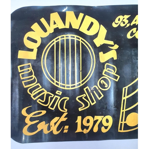 175 - Louandys music shop, Colne, plastic advertising sign,

76 x 30cm