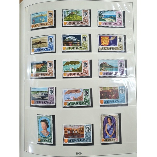 230 - Blue Jersey Channel Islands stamp album containing MU Jersey sets 1969 to 1989 including the 1969 de... 