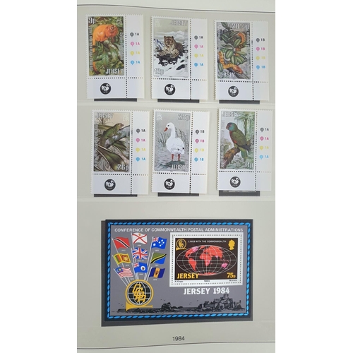 230 - Blue Jersey Channel Islands stamp album containing MU Jersey sets 1969 to 1989 including the 1969 de... 