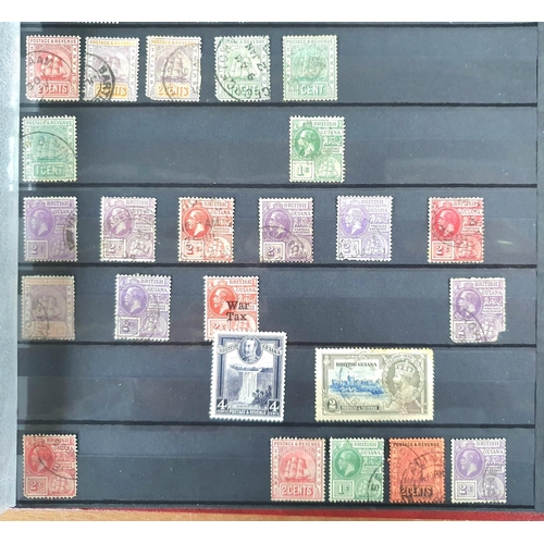 256 - Red stamp album filled with Commonwealth 