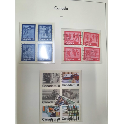 294 - Boxed red Canada album containing mint and used Canada sets and mini-sheets 1979-1992