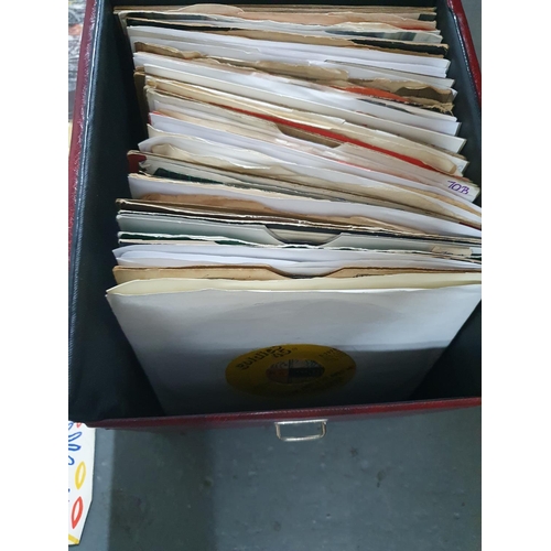 306 - Singles box containing a quantity of 1980s singles by various artists including Status Quo, David Bo... 