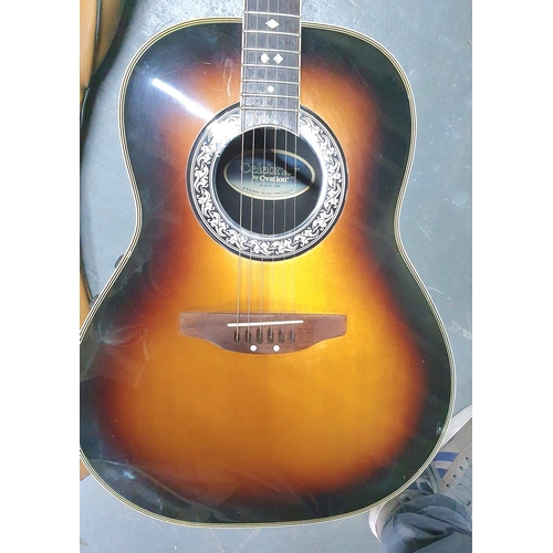 314 - Celebrity acoustic-electric 6 string guitar by Ovation, model number 667, with soft carry bag