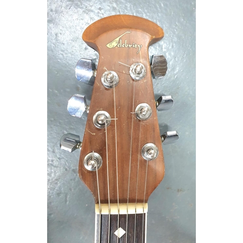 314 - Celebrity acoustic-electric 6 string guitar by Ovation, model number 667, with soft carry bag